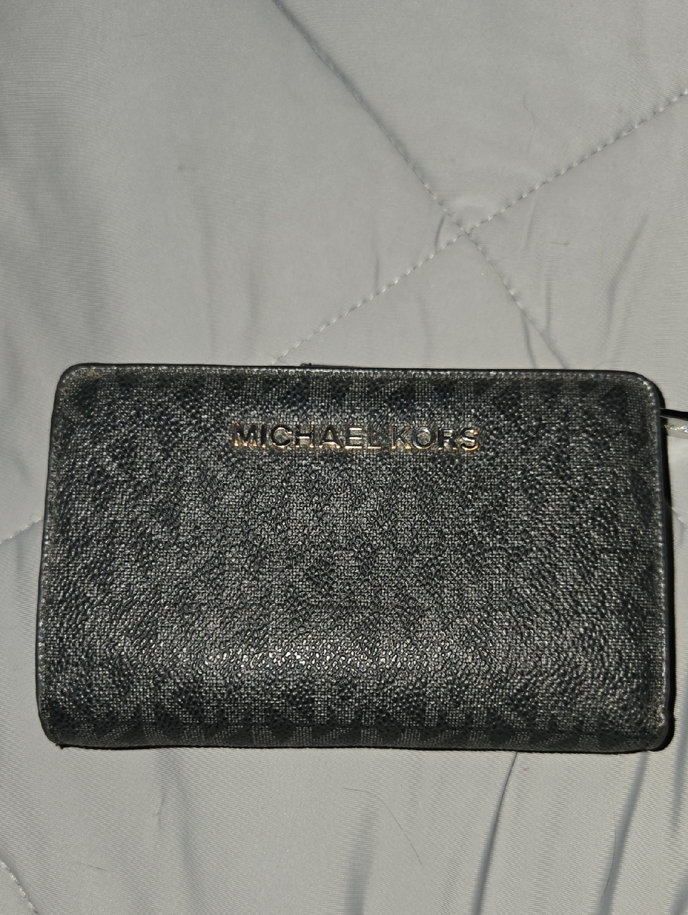 Michael Kors Jet Set Travel wallet in a black signature logo print